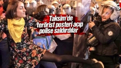 Taksim'de terörist posteri açıp polise saldırdılar