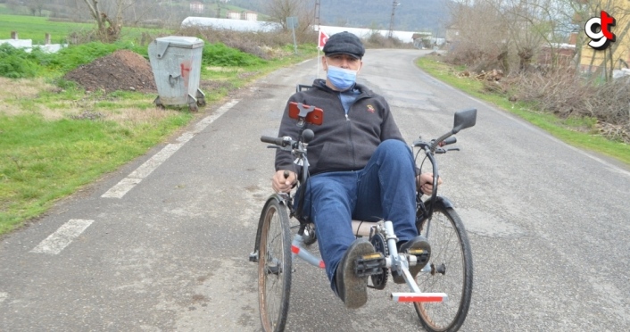 Hurda malzemelerden yaptığı üç tekerlekli bisiklet görenlerin beğenisini kazanıyor